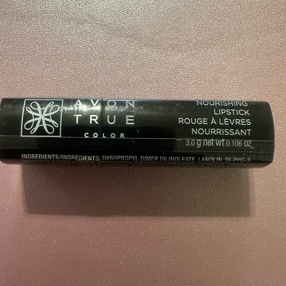 New sealed Avon True Color Candy Red lipstick.